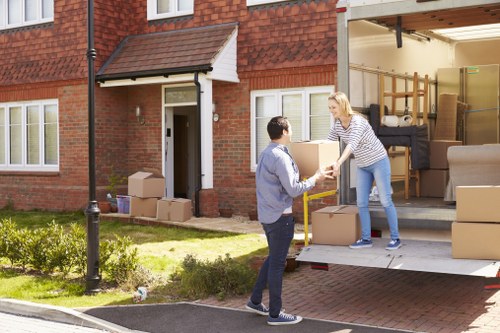Furniture collection team working in a Queens Park residential street