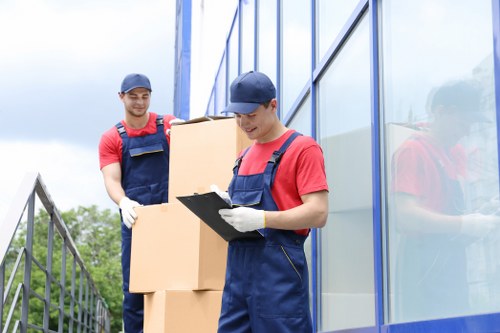 Moving crew applying safe handling practices