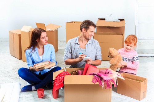 Moving van and removal crew handling an urgent property move in Queens Park