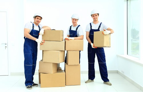 Packing and loading belongings into a removal van in Queens Park